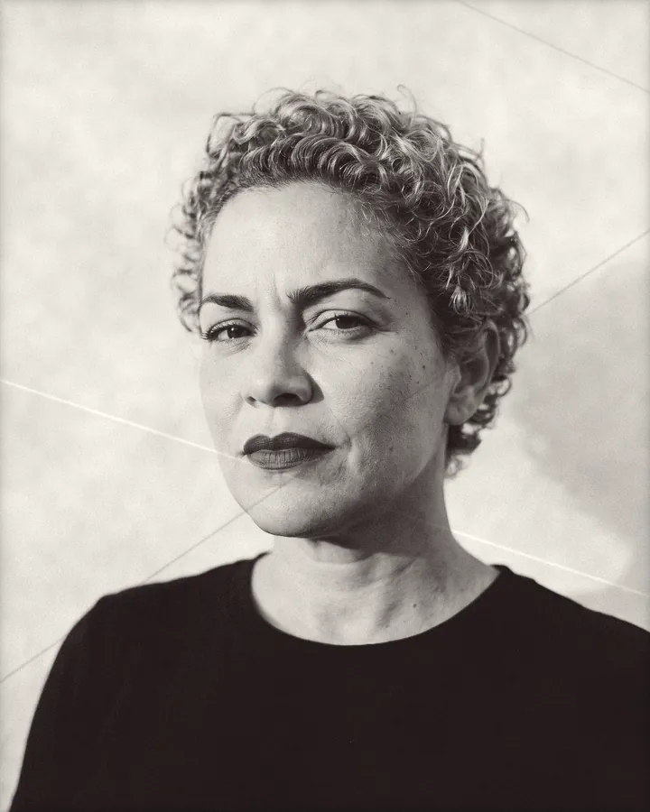 Portrait of a bold woman with short honey-blonde curls and red lipstick, printed for the wall