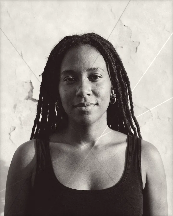 Portrait of a young woman with long locs to her waist, printed for the wall