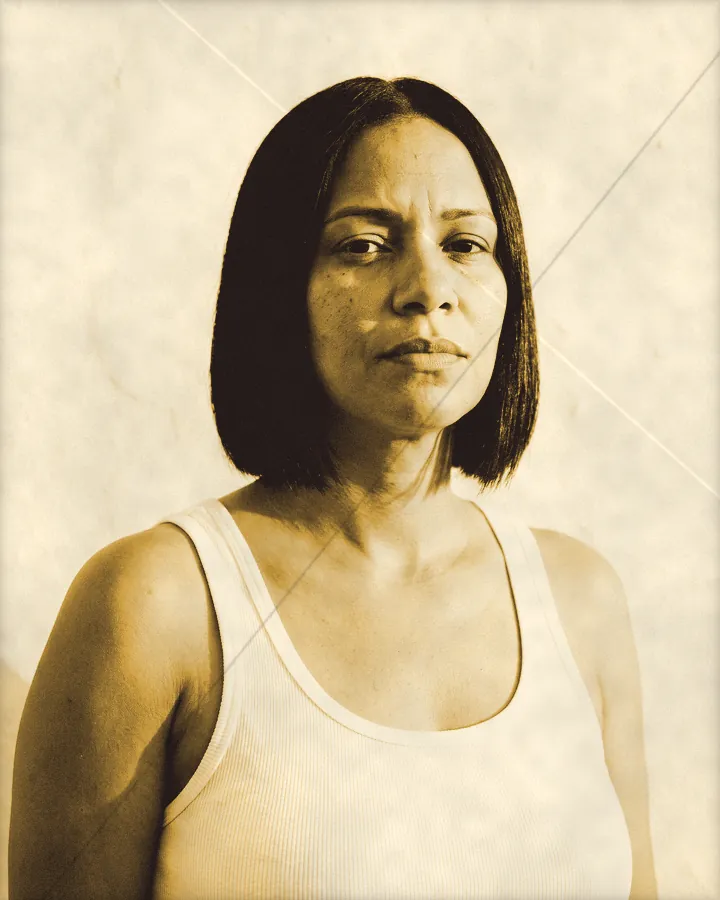 Portrait of a confident woman with a sharp black bob, printed for the wall